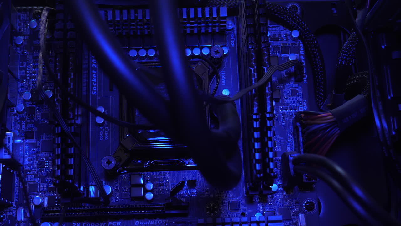 An up-close of the computer motherboard, in dynamic changing hues, symbolizes the forefront of innovation and connectivity in the digital age