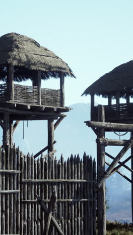 a medieval wooden gate with towers