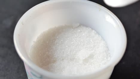 close-up of granulated sugar in a bowl