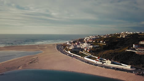 Aerial-view-from-the-inshore-towards-the-sea,-at-Foz-do-Arelho,-Portugal