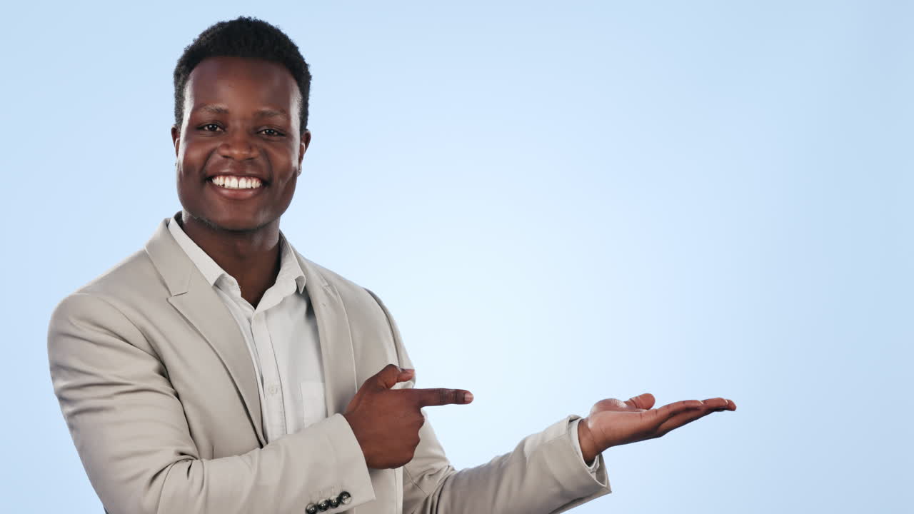 Happy black man, pointing and palm in advertising