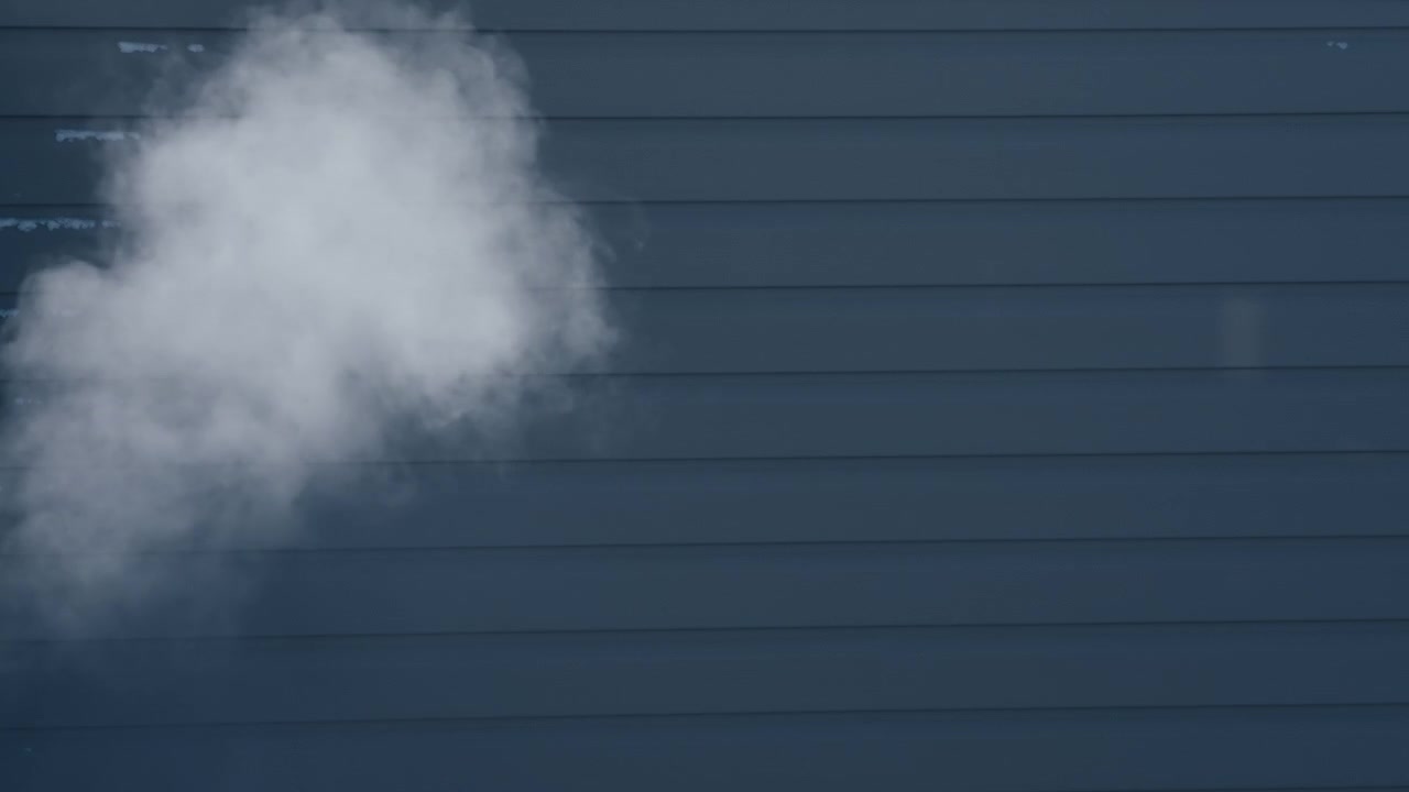 Steam in the air on a winter day outside