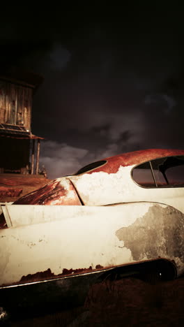 rusty car in a desert