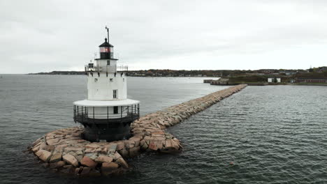 Beautiful-aerial-shot-of-a-Lighthouse-on-a-cloudy-day