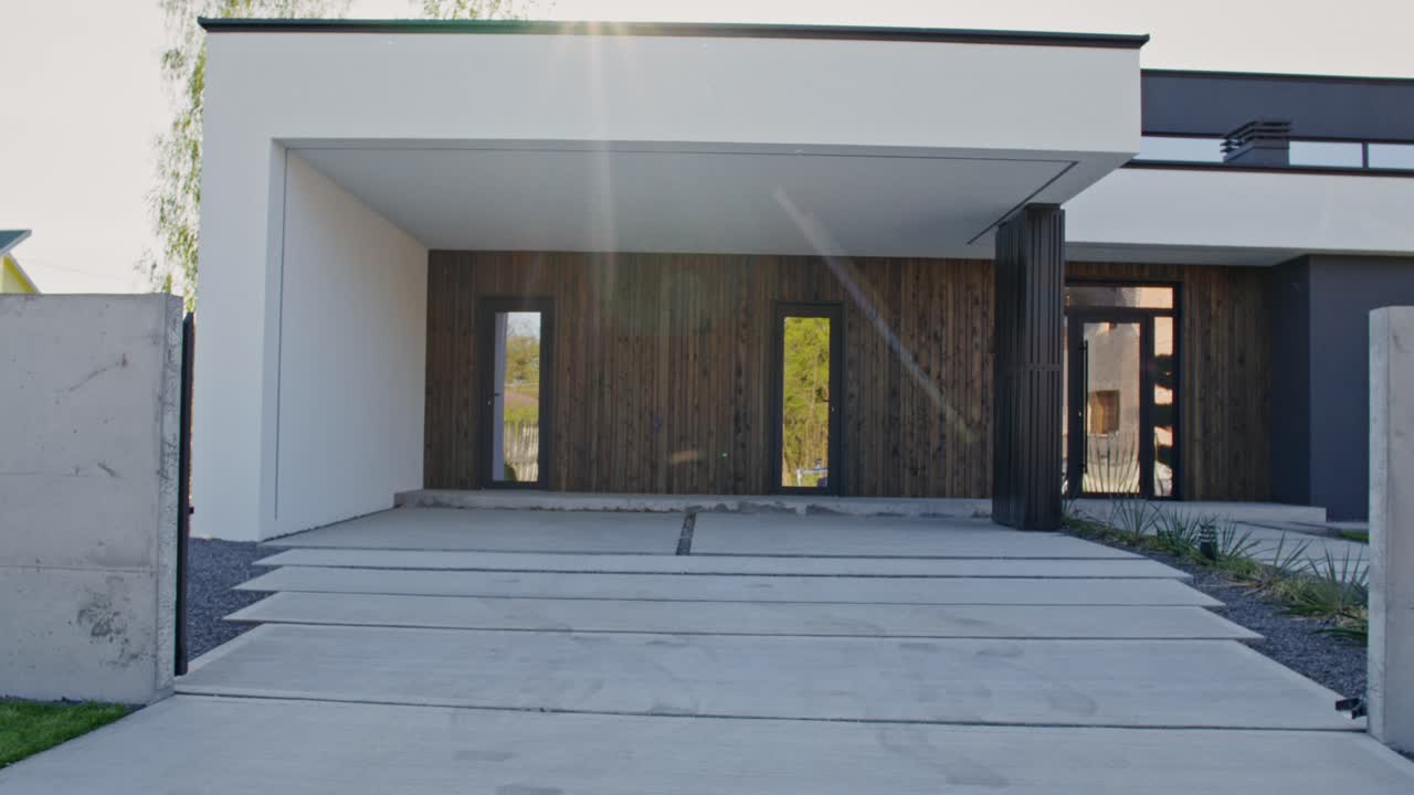 Modern House Exterior with Concrete Driveway