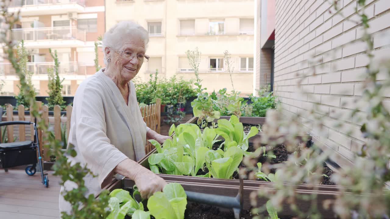 Elderly woman gardening on her balcony