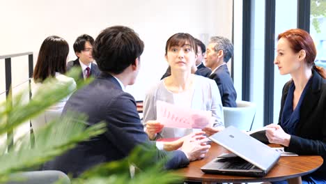 businesspersons having a meeting in an office