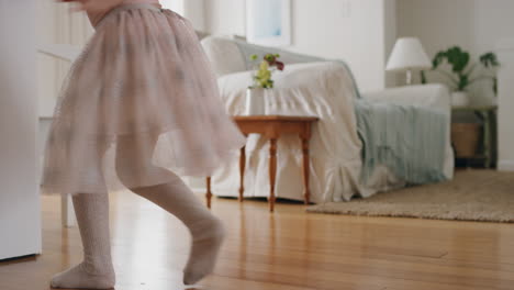 cute-little-girl-dancing-playfully-pretending-to-be-ballerina-happy-child-having-fun-playing-dress-up-wearing-ballet-costume-at-home-4k