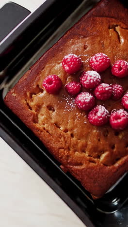 raspberry cake with powdered sugar