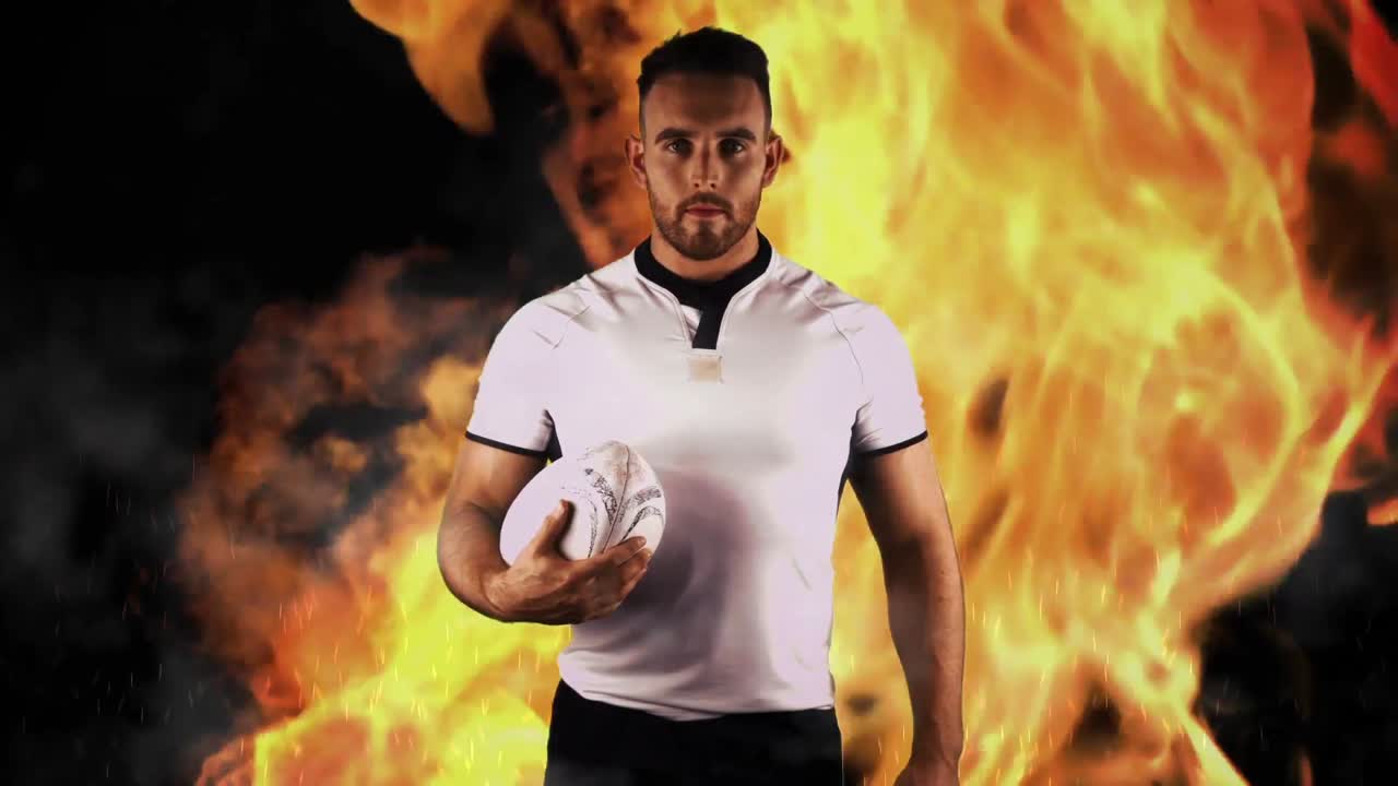 jugador de rugby duro sosteniendo la pelota