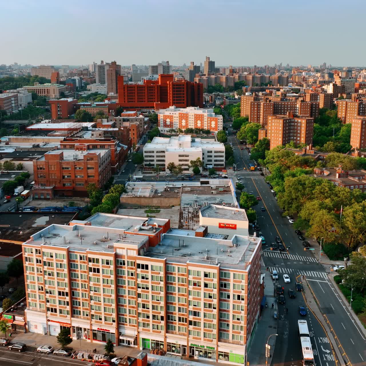 Neighborhoods of New York on sunny daytime. Top view on the residential areas at sunset
