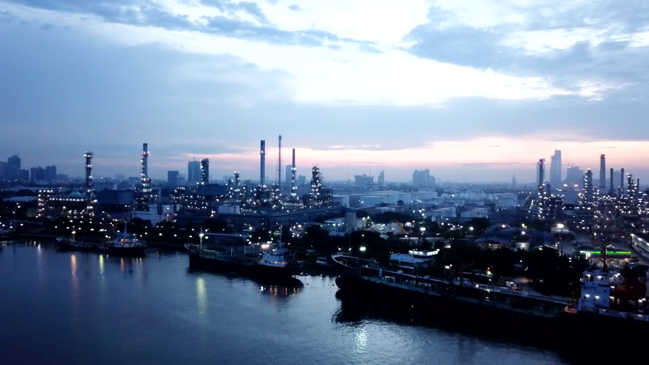 4K video : aerial view of oil refinery with sunrise