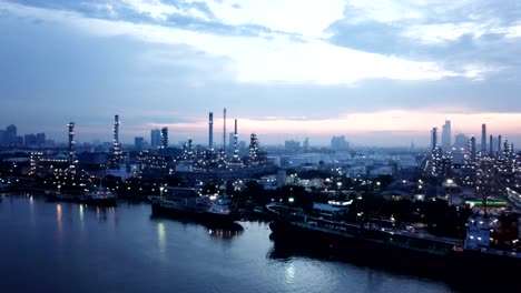 4k video : aerial view of oil refinery with sunrise