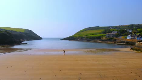 Woman-walking-on-the-beach-4k