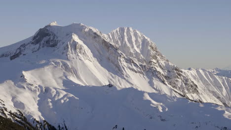 giant snow covered mountain, bc, canada. aerial shot