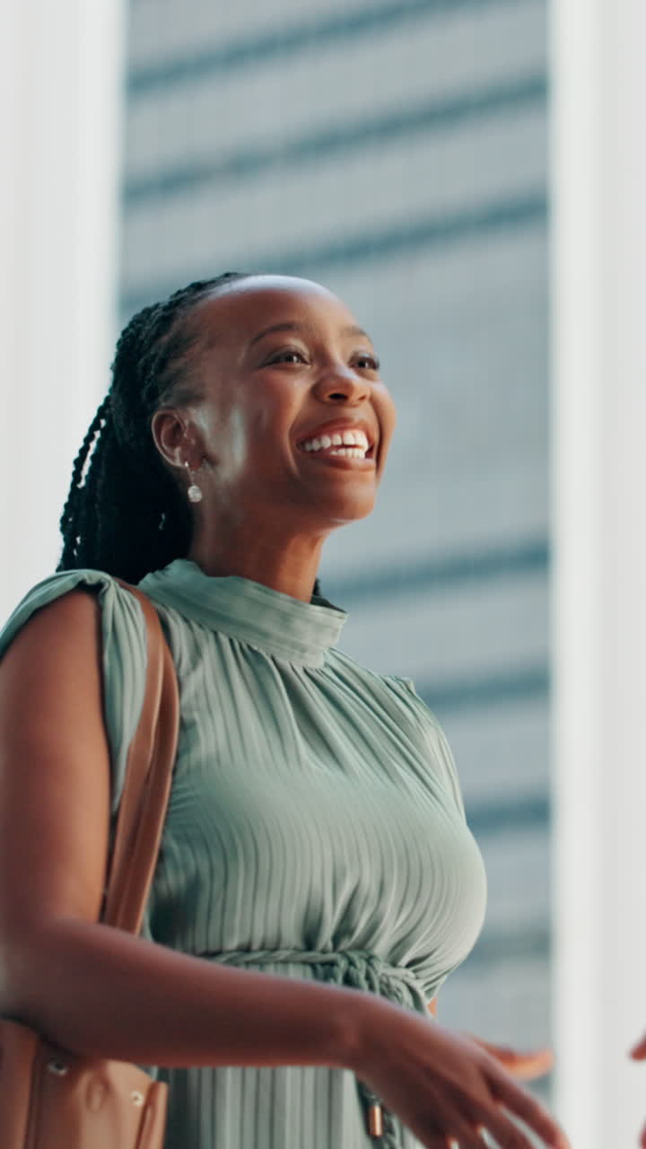 Happy Black Businesswoman Shaking Hands and Talking Outdoors