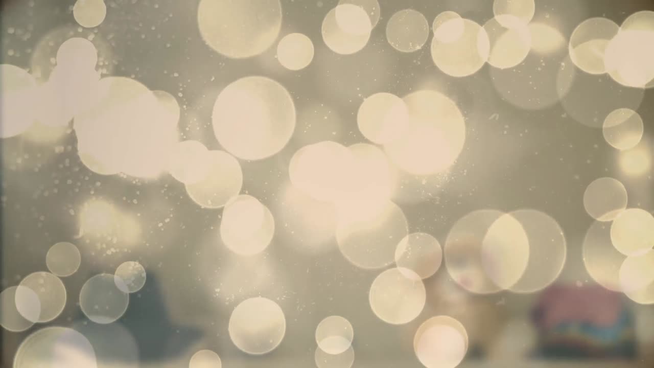 animación de puntos de luz en un fondo borroso