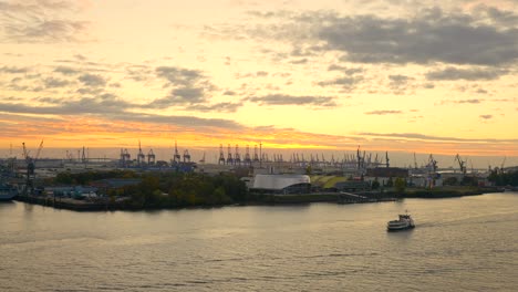 view on river and cargo port at sunset