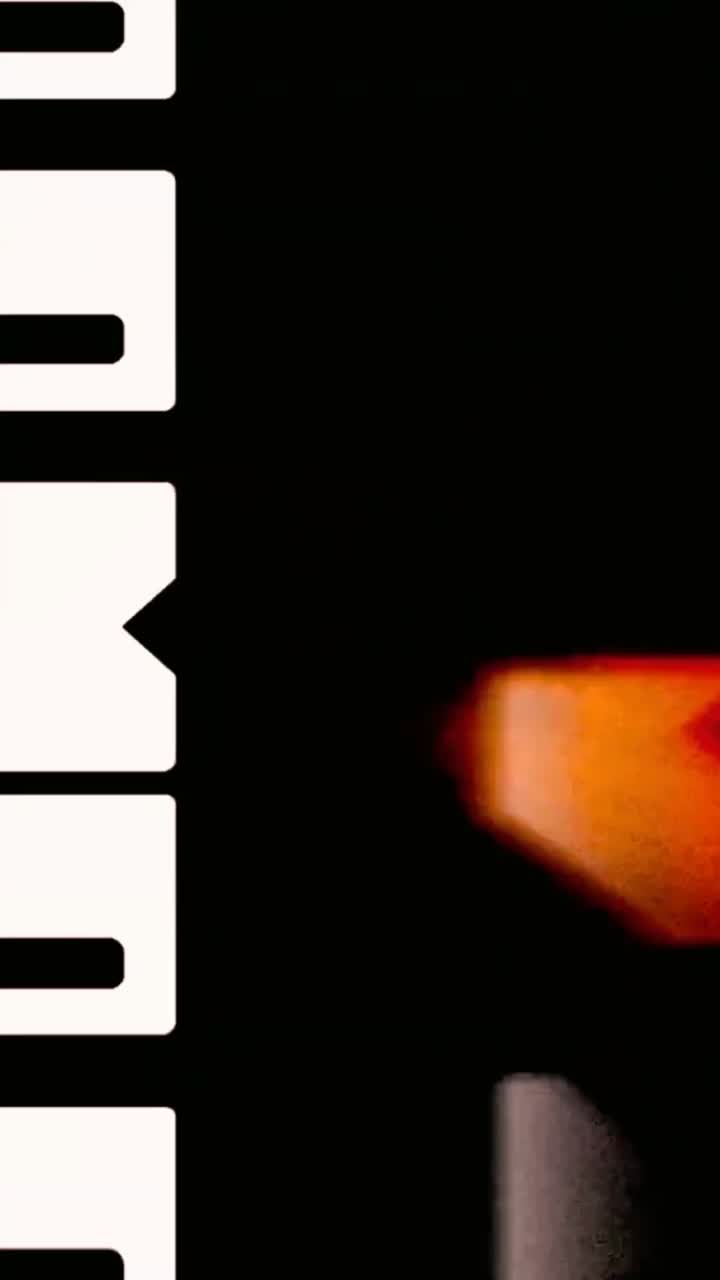 Abstract Film Strip Leader Moving Vertically with Red and White Glow