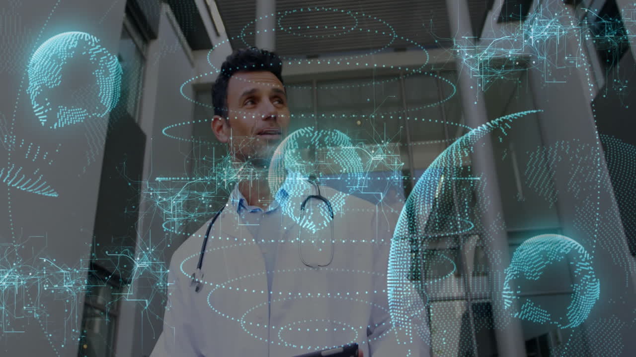 Male doctor wearing lab coat and stethoscope observing floating health network globes indoors