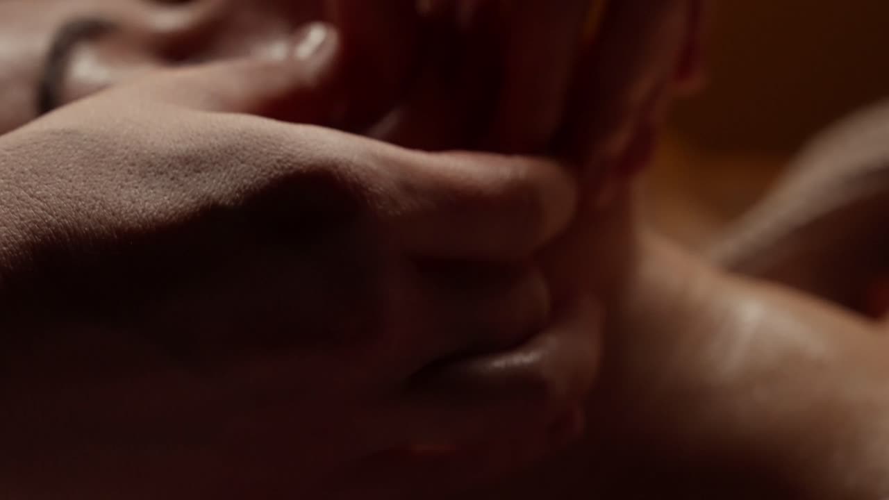 Close-up of Woman Receiving Relaxing Facial Massage at a Spa