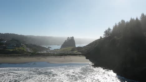 epic aerial of northern california coastline with rocks, cliffs, forest and waves