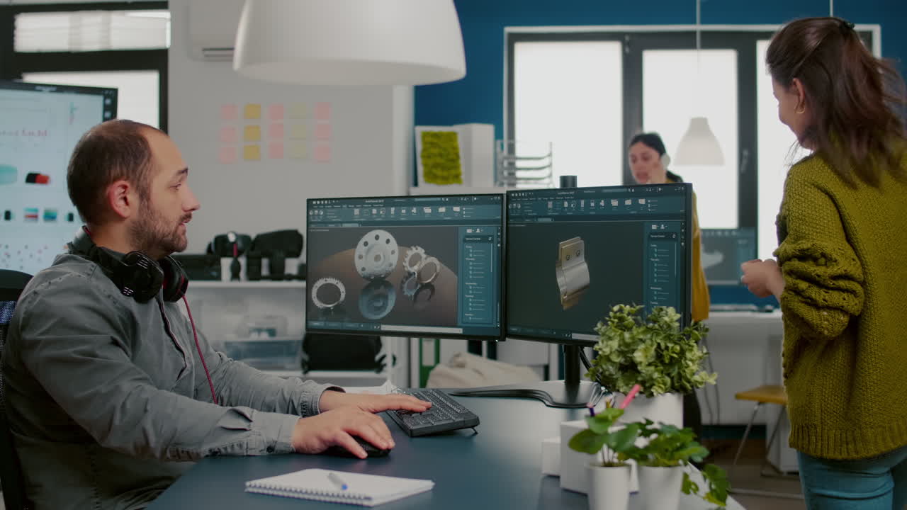 Diverse team of engineer architects working on modern cad program