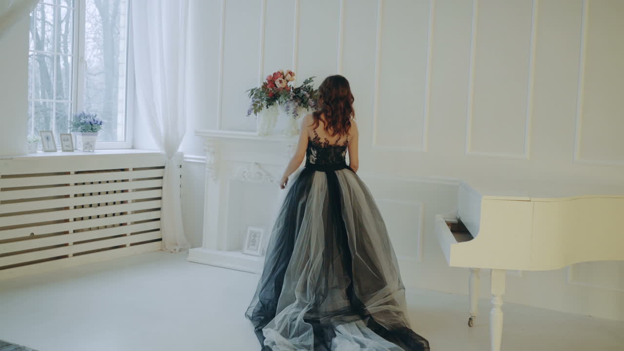 Girl dressed in evening dress. Charming young woman with evening dress and make up posing in studio