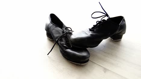 dancing shoes on wooden floor