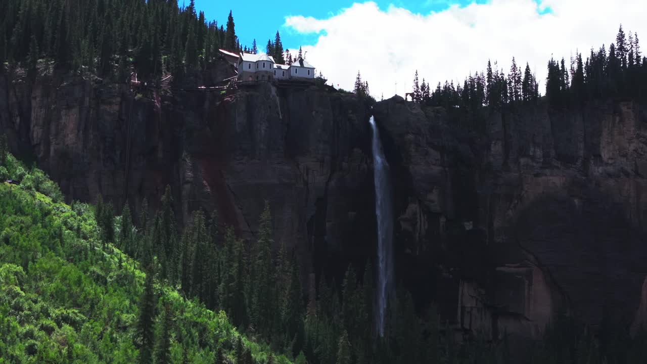 Telluride Bridal Veil Falls aerial drone Waterfall Telluride Black Bear Pass Road Colorado powerplant windy mist spray Ouray Ridgway Box Canyon cliffside 4wd hiking cloudy sun blue sky forward motion