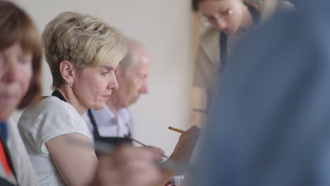 a group of seniors sent in drawing training to spend time together