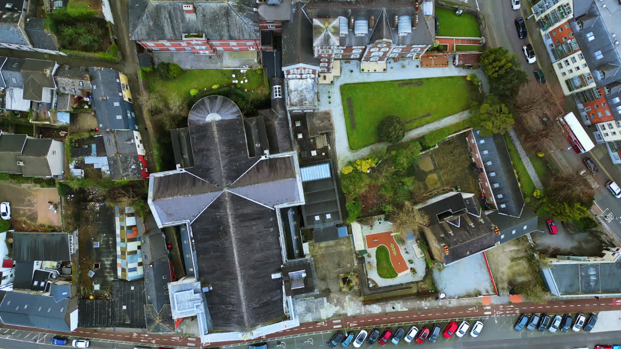 Aerial drone view of the River Liffey in Dublin, showing bus lanes, and riverside buildings