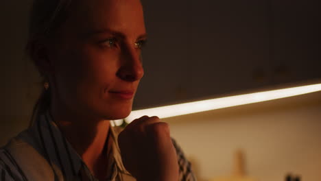 close-up of thoughtful woman looking at sun rays