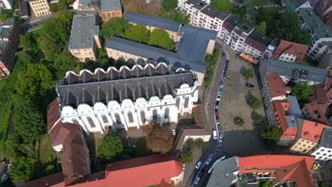Dome to halle in the city in germany is shining on a sunny summer day. Great aerial view flight drone camera pointing down
