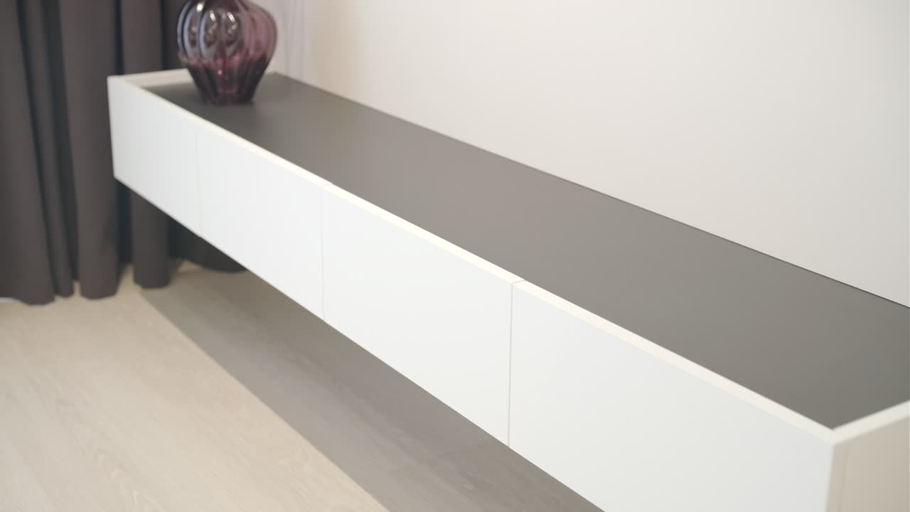 Modern Floating Shelf with Decorative Purple Vase in Minimalist Interior