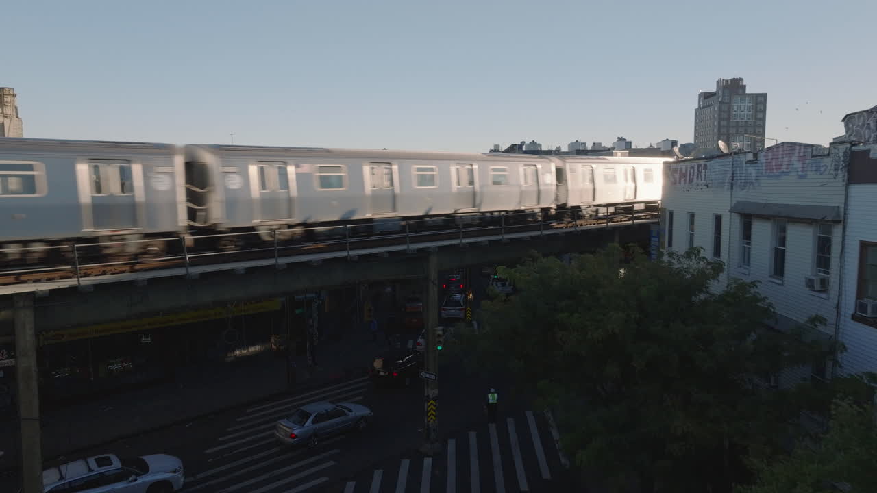 Aerial view of the subway in Brooklyn at sunrise. Shot on an autumn morning in New York City