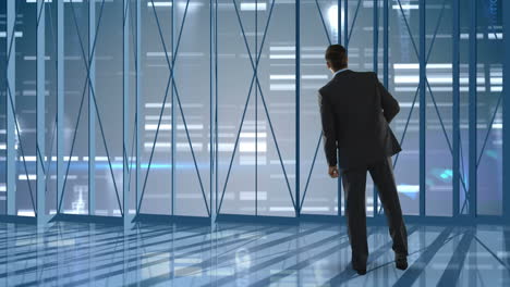 businessman looking outside of empty office