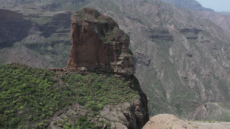 aerial-shot-revealing-the-fantastic-Roque-Palmes-on-the-island-of-Gran-Canaria,-municipality-of-Tejeda