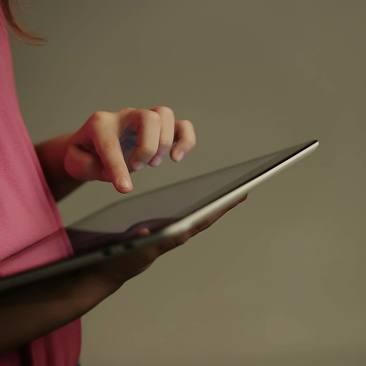 Female student using digital tablet