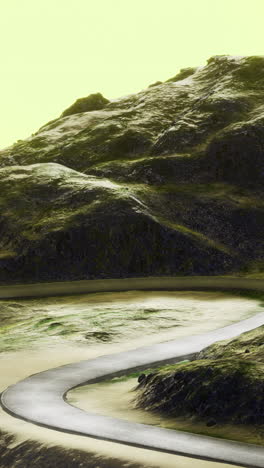 winding road through rugged mountains under a golden sky at twilight