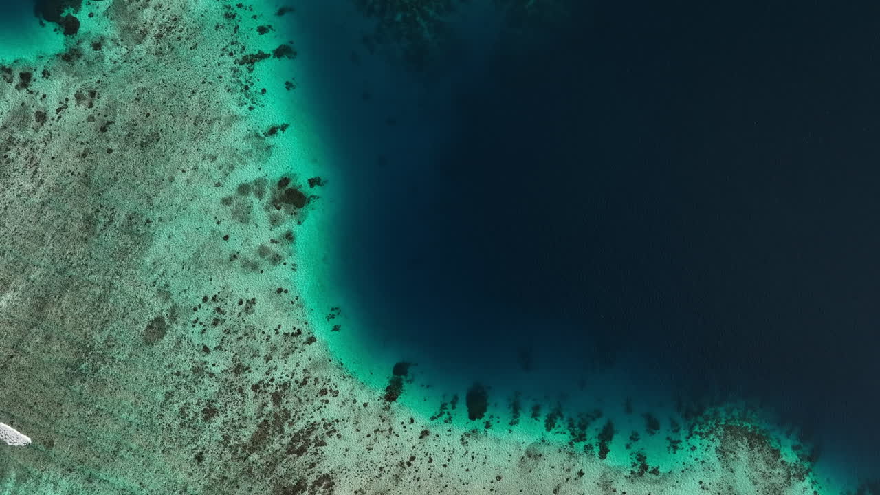 Beautiful views over the coral reef lining the nearby island of Mbambanga in the Solomon Islands