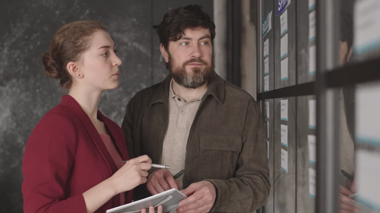 Business Woman and Man Working