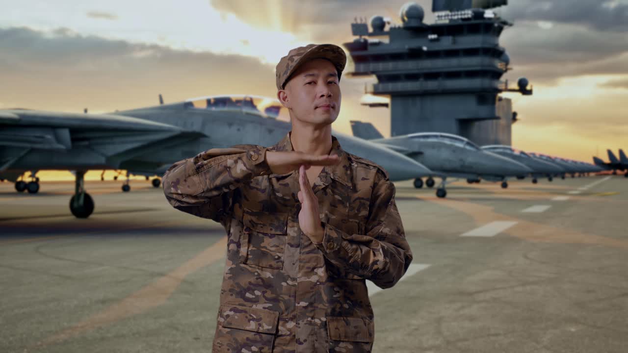 Military Personnel on Aircraft Carrier Deck