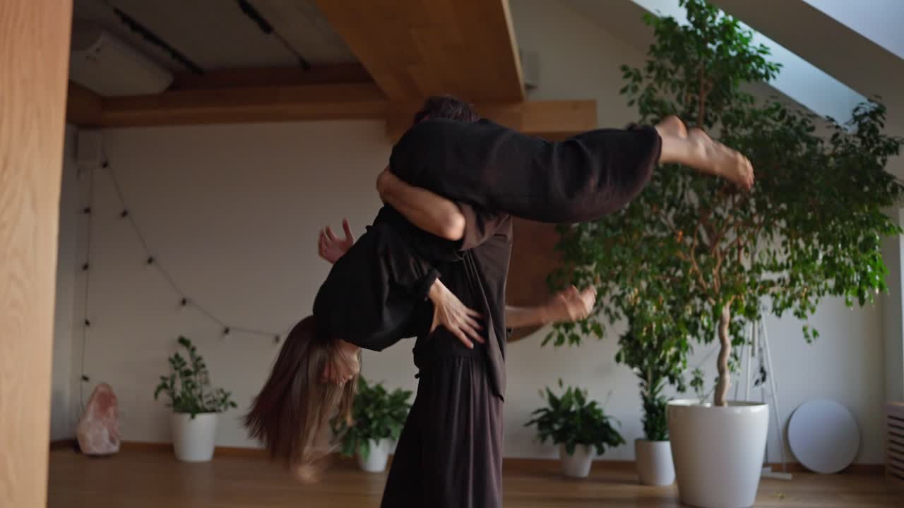 Couple dancing indoors