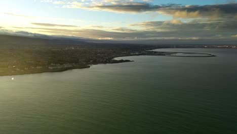 golden wintery evening on dalkey coastline, dublin, ireland