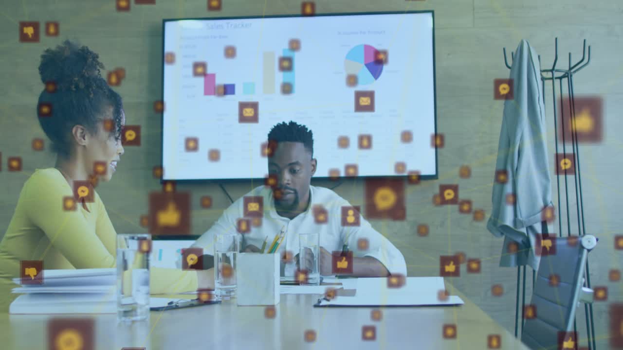 Animation of network of connections and icons over business people in office
