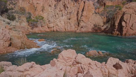 mediterranean natural water turquoise pool at cami de ronda ocean cliff spanish costa brava region, panoramic slow motion landscape