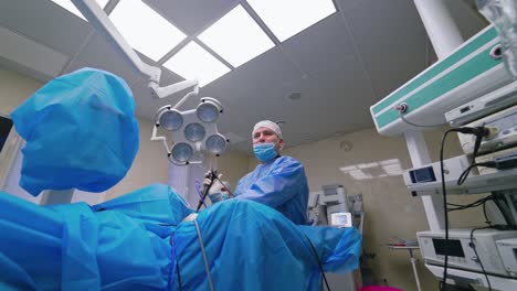 surgeon leading operation. surgery medical doctor operating in surgery room of the hospital