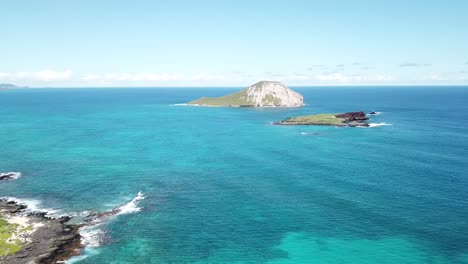 drone flying towards island state seabird sanctuary.mp4