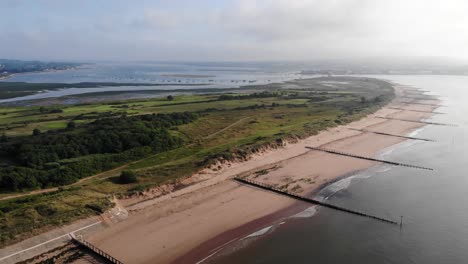 Aerial-View-Of-Empty-Dawlish-Warren-Beach-In-South-Devon